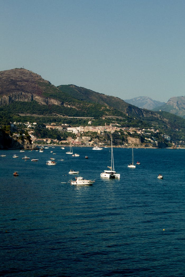 Beautiful view of Sorrento's coastline with boats on the Mediterranean Sea, Italy.